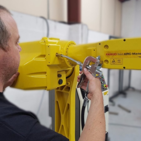 servicing a fanuc refurbished robot