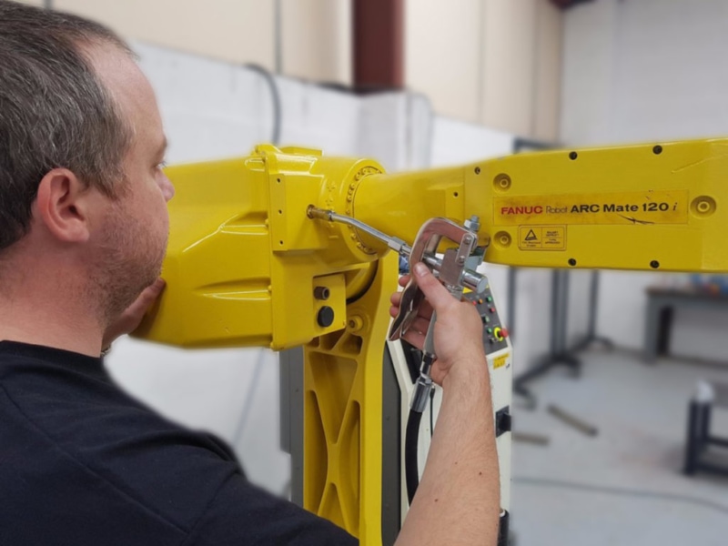 servicing a fanuc refurbished robot